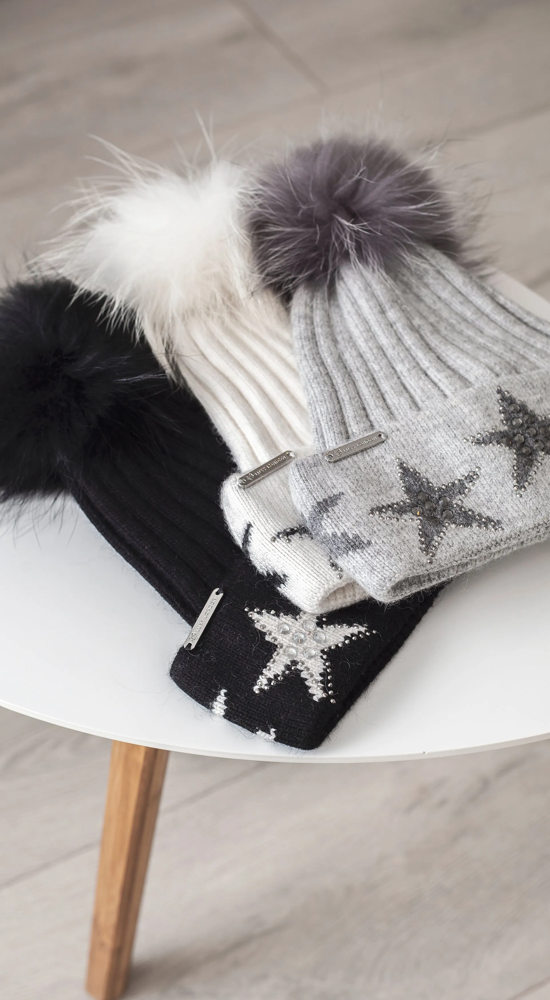 Phoenix Star Embellished Pom Pom Hat - Black